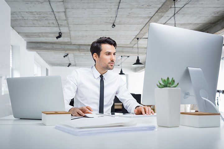 Businessman working at his office desk