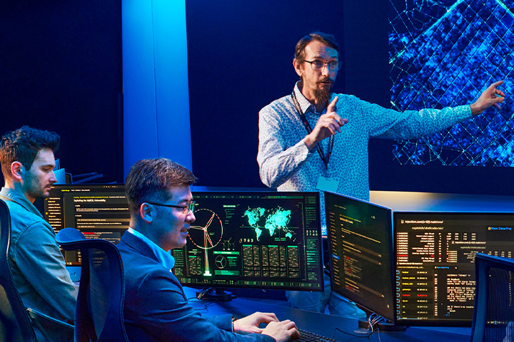 A teacher explains network security concepts to a class of students.