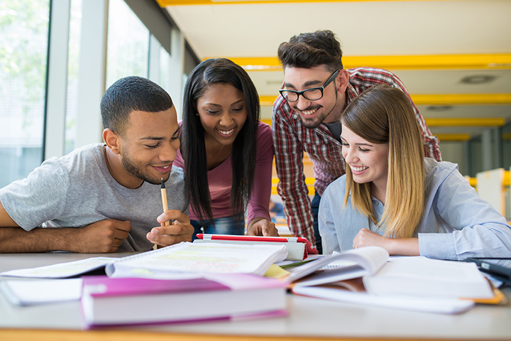People from various backgrounds collaborating on studies