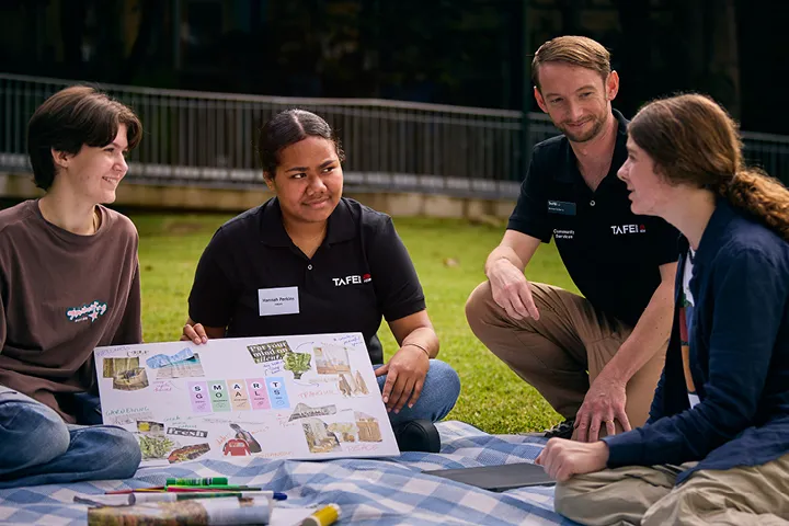 Group of people having a chat in the outdoors.