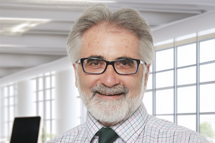 This image is a headshot of Danny O’Connor, smiling at the camera.