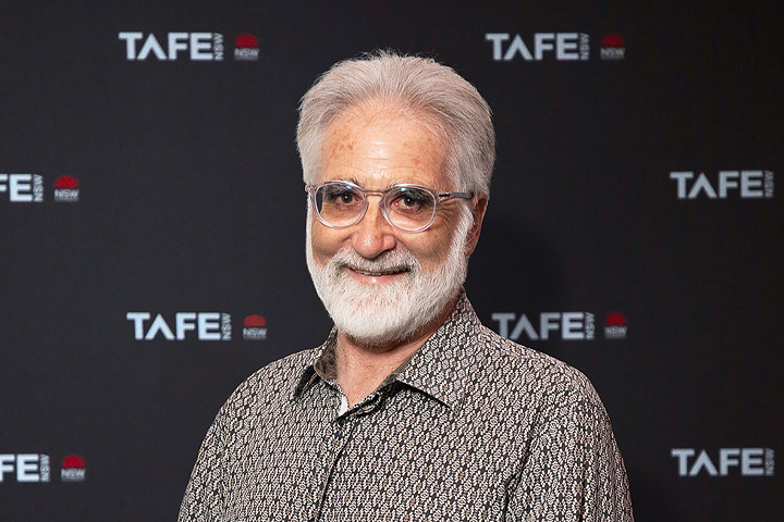 This image is a headshot of Danny O’Connor, smiling at the camera.
