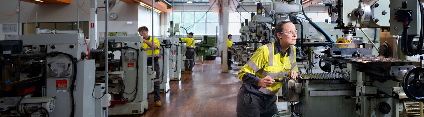 Engineers operating machines
