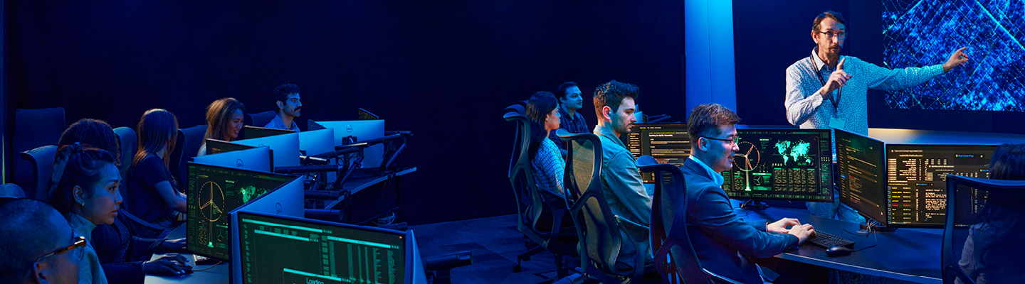 Instructor teaching cyber defense strategies