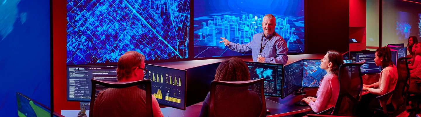 Instructor teaching cyber attack techniques