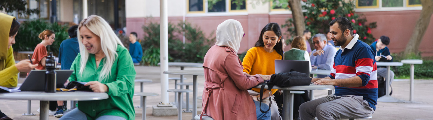 People from different backgrounds sitting in one of the TAFE NSW's campuses