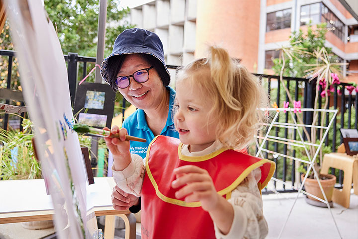 Early childhood education teacher and child