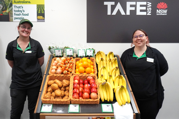 Mini Woolies students in Tamworth surrounding fruit display