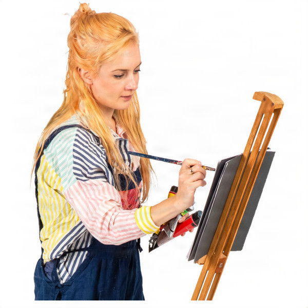 A young woman painting on a canvas at an easel.