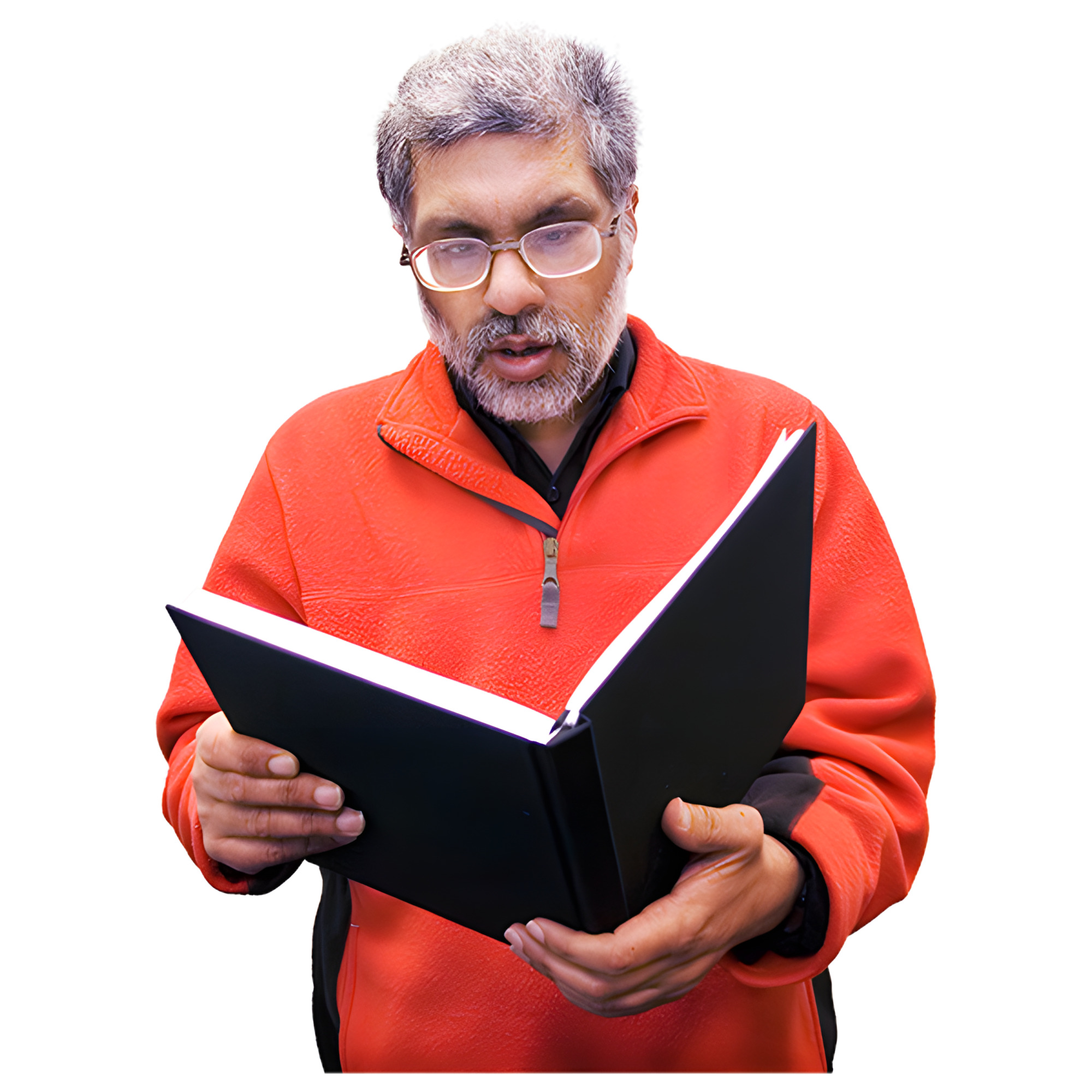 Man with glasses and a red jacket reading a large black book.