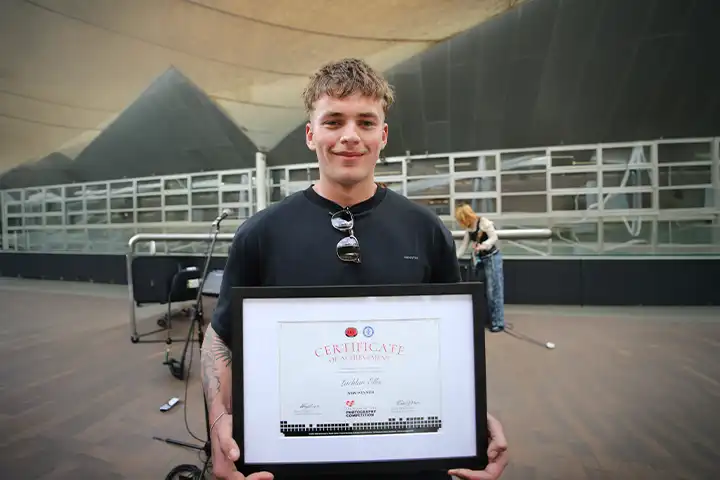 Lachlan Ellis with winning certificate