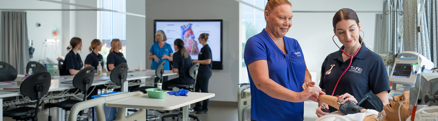 Participants engaged in a nursing training workshop