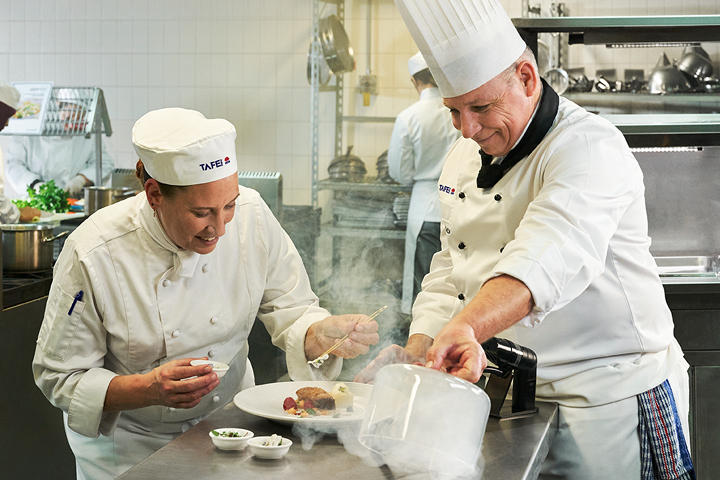 Chefs working in a commercial kitchen